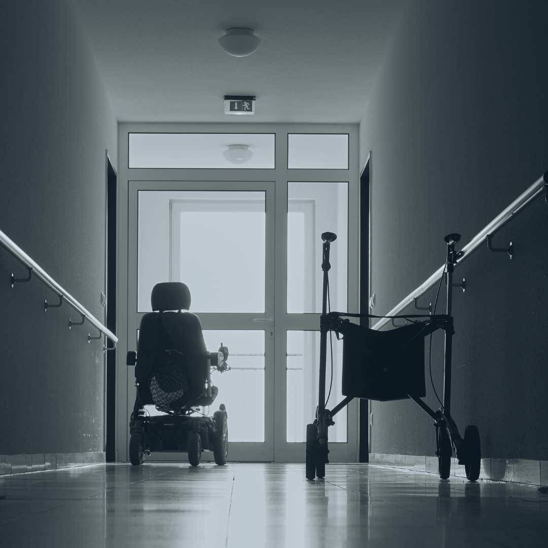 A wheel chair in a hallway